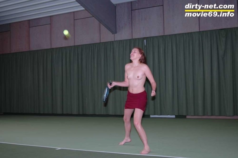 Nathalie plays naked tennis in a tennis hall #4