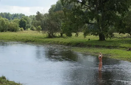 nude in rivers water         