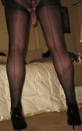 long luscious legs encased in sheer black silk ff nylons         