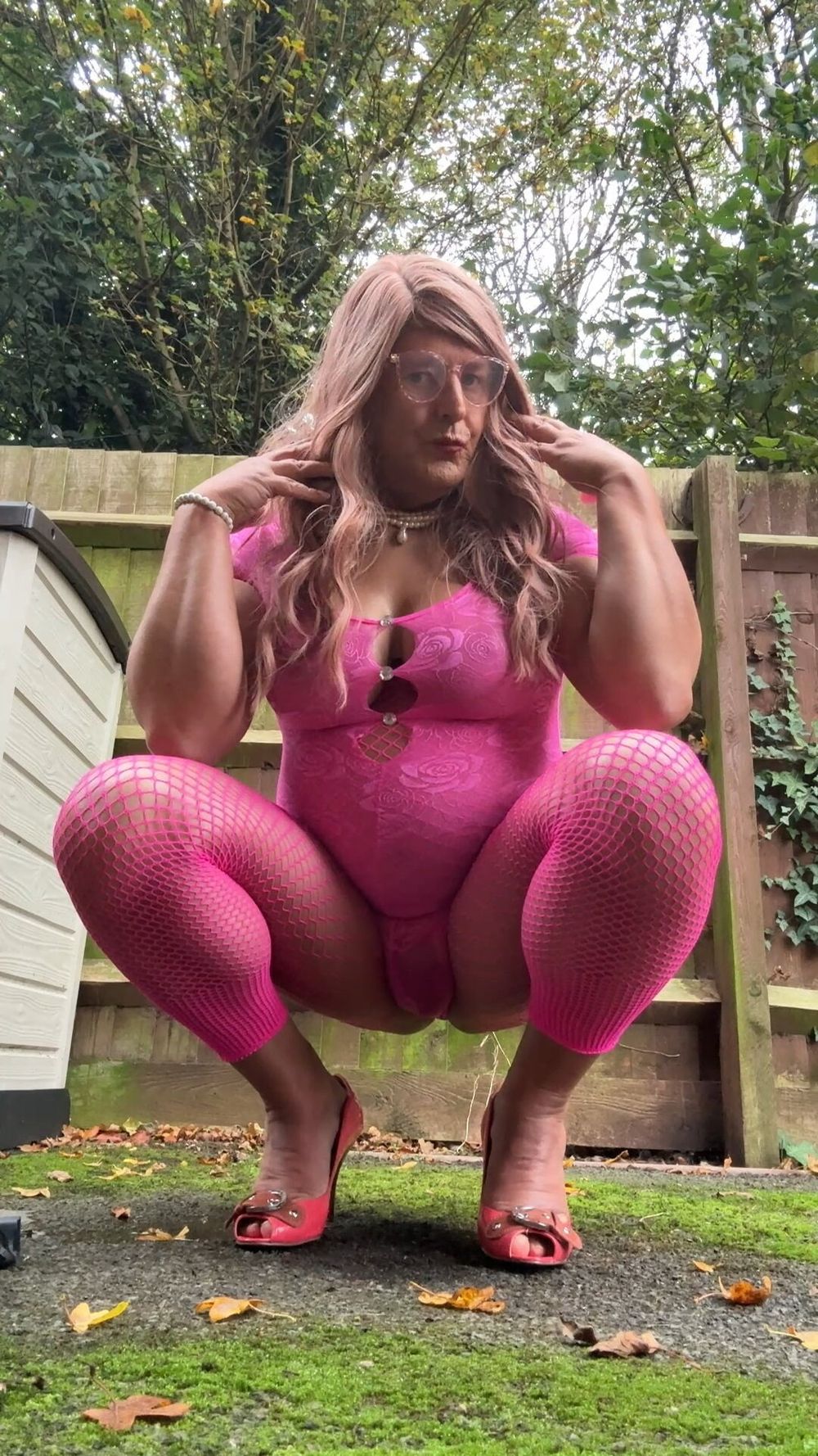 Crossdresser kellycd2022 in pink playsuit and fishnets  #11