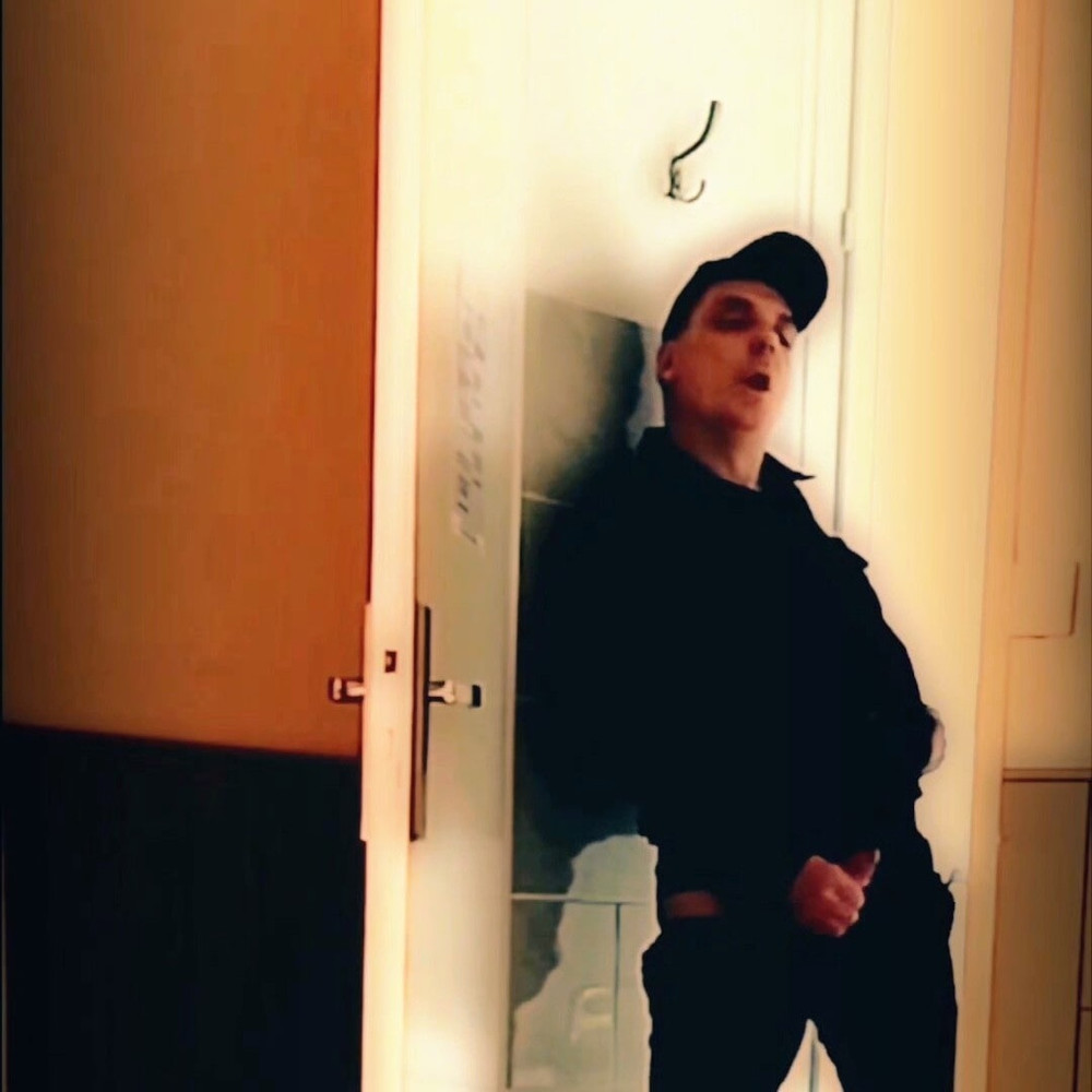 Handjob standing in front of a door #7