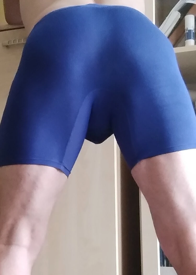 From behind