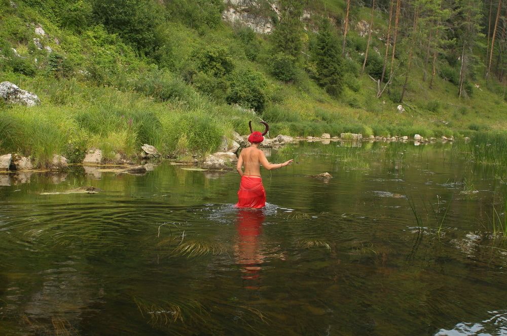 With Horns In Red Dress In Shallow River #9