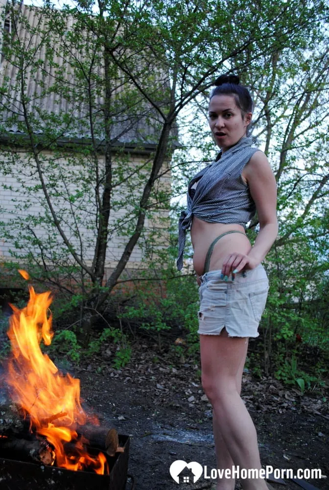 Barbecuing makes her hot so she strips #53