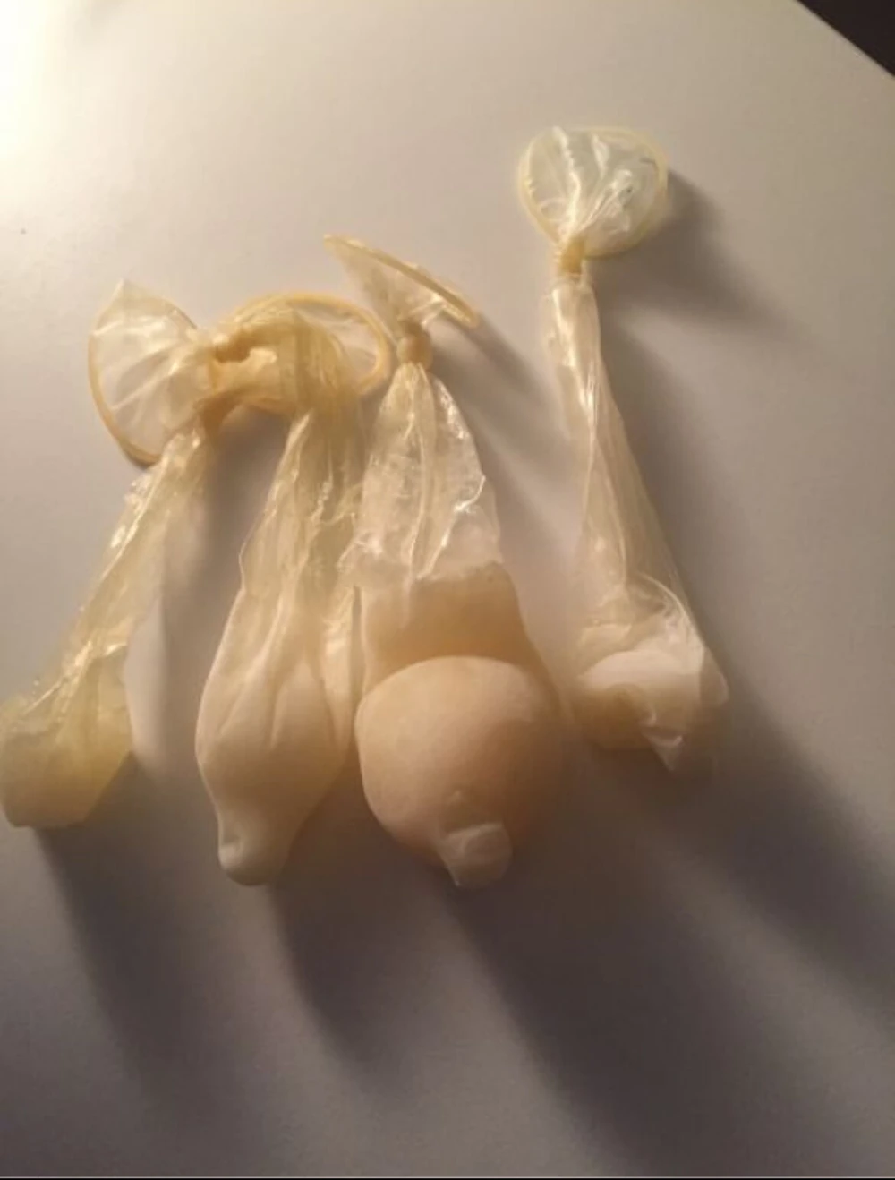 Frozen cum and cumfilled condoms