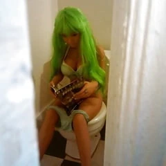 Nina on the crapper