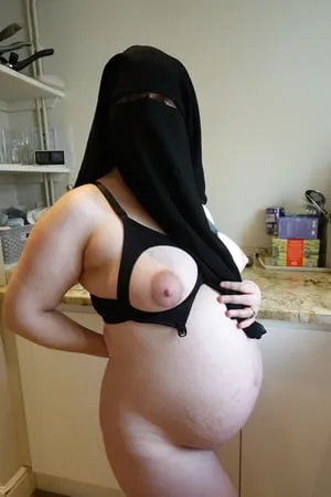 pregnant wife in muslim niqab and nursing bra         