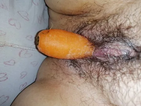 Fucking my pussy with a carrot mmm