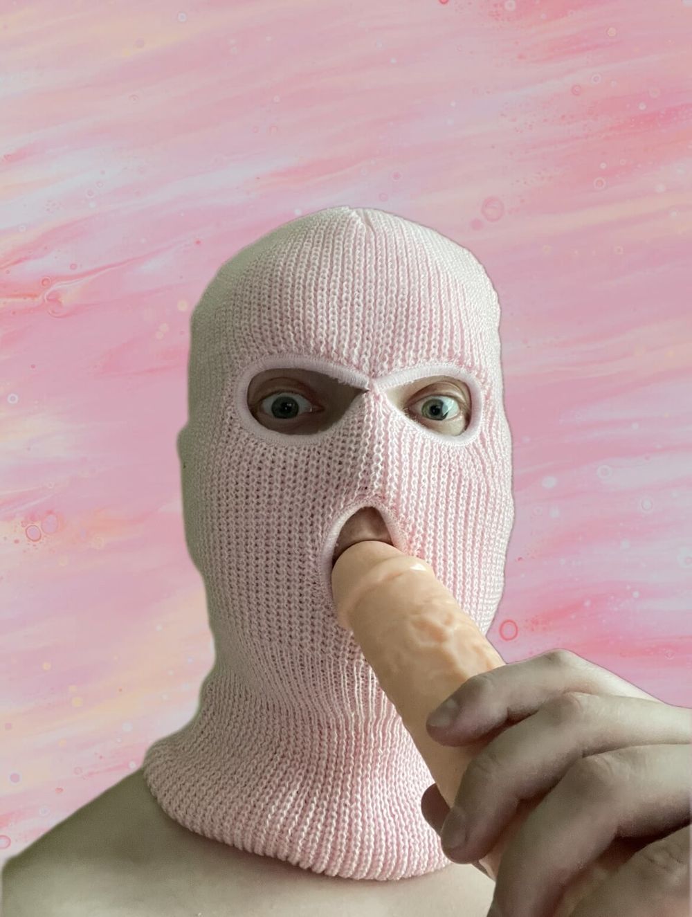 Playing with a dildo in a pink mask #3