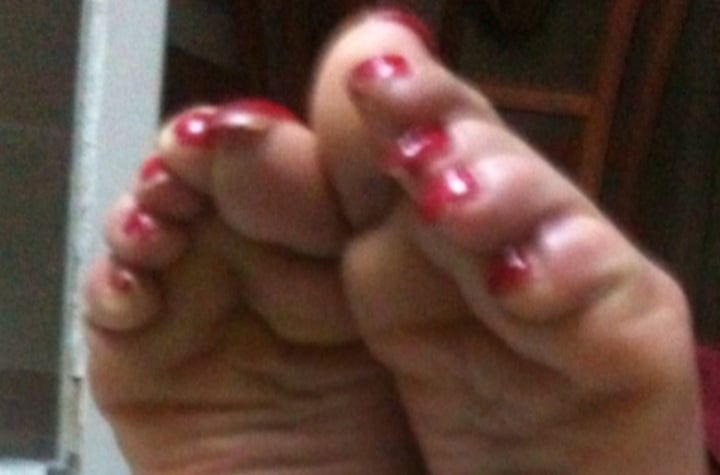 used red toenails, and soles feet after day at beach #14