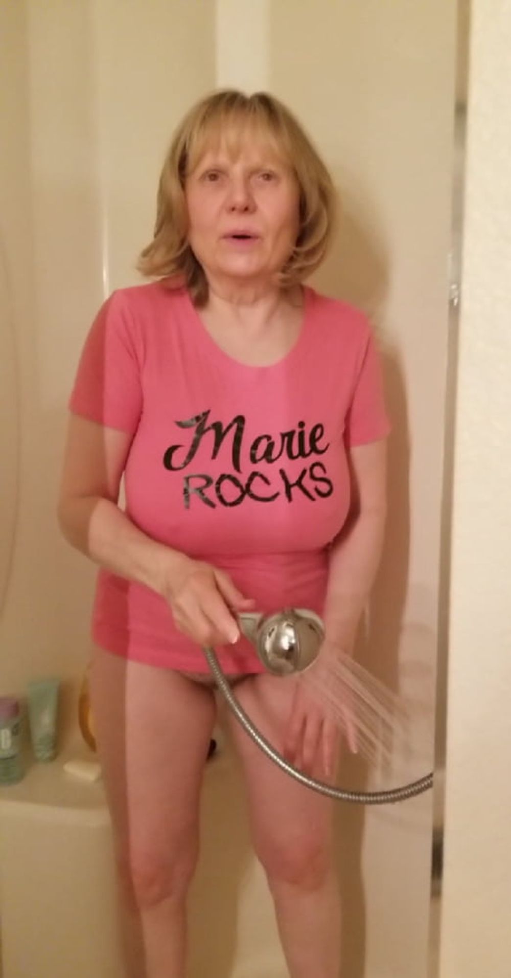 Hot grandmother sprays her pussy and cums in a wet t-shirt #10