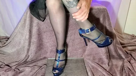 see through skirt pantyhose and high heels feet         