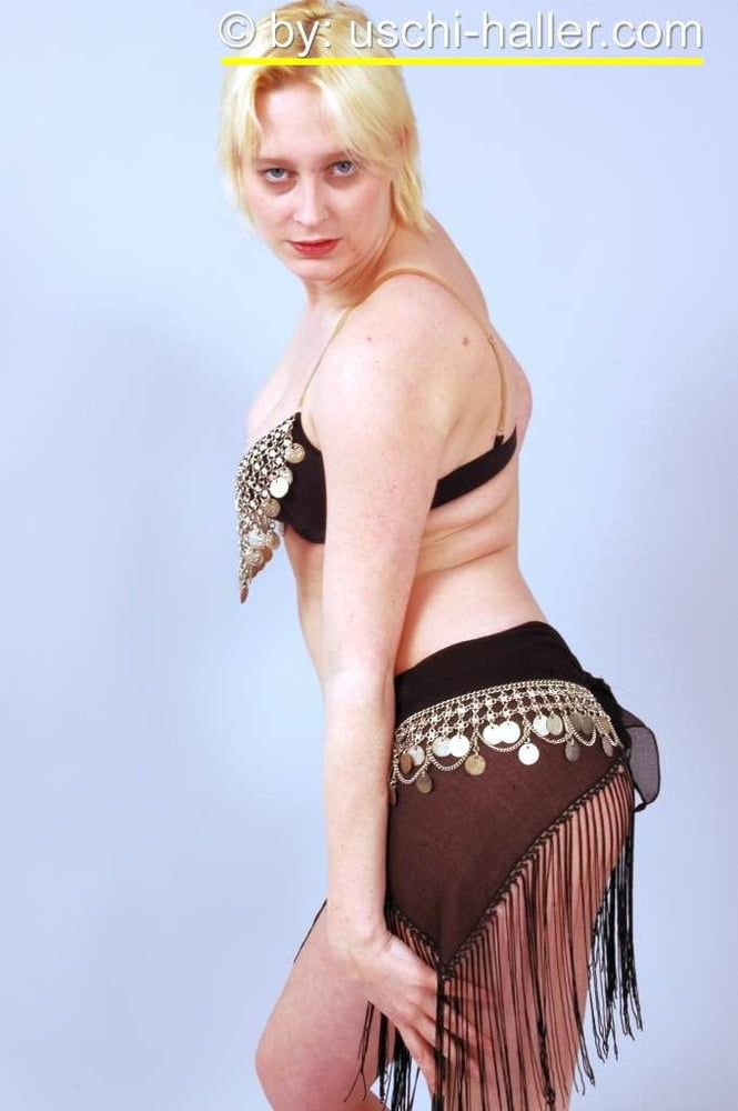 Photo shoot with blonde cum slut Dany Sun as a belly dancer #8