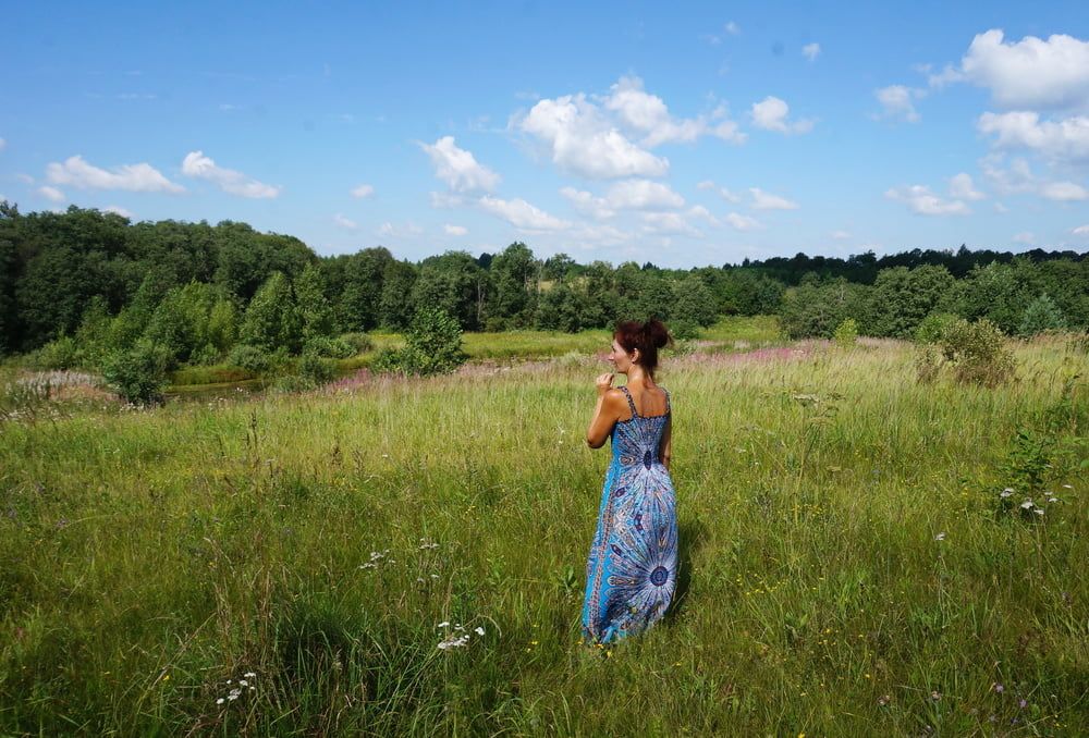 In blue dress in field #27