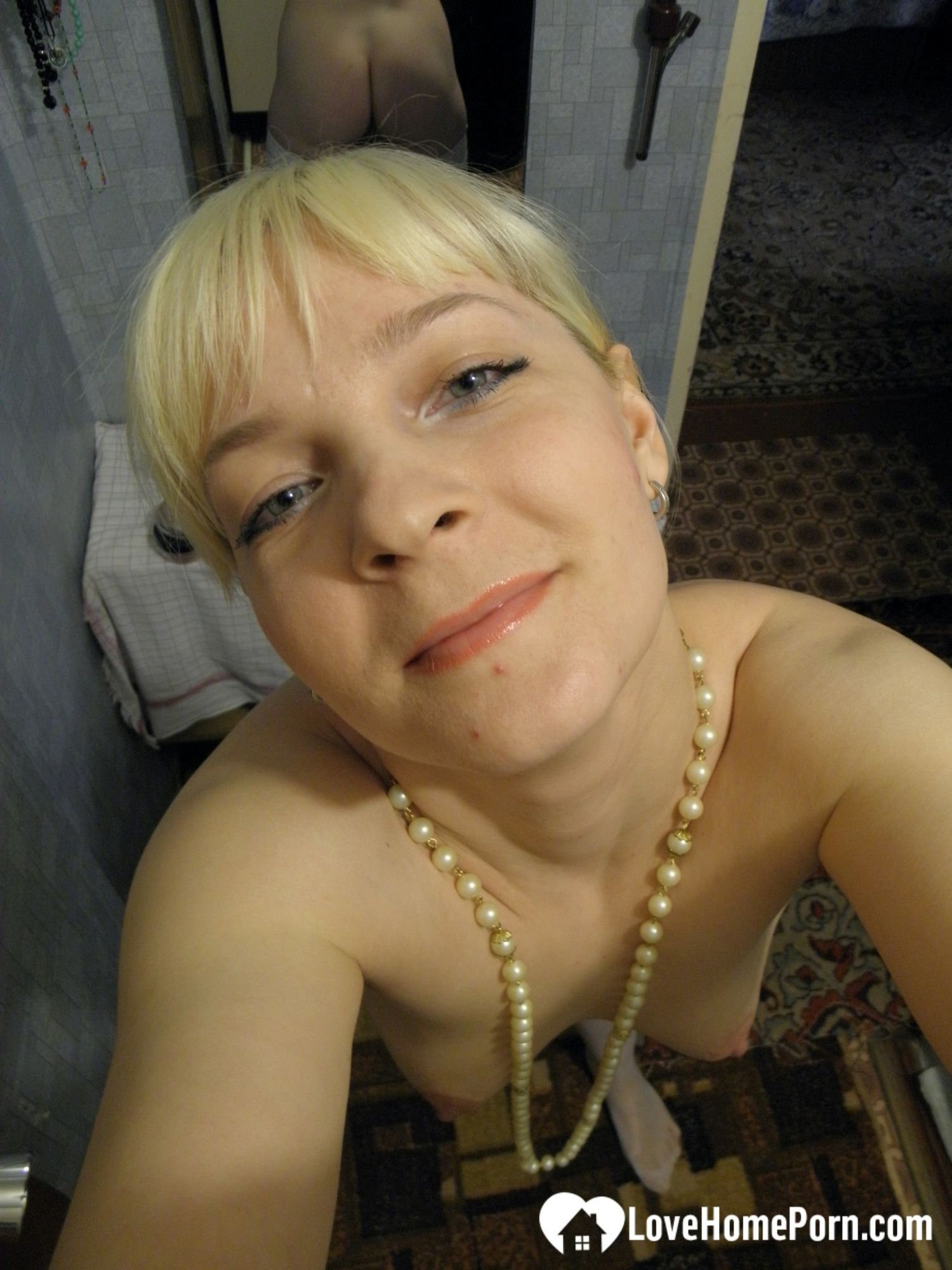 Aroused blonde in stockings taking naughty selfies #31