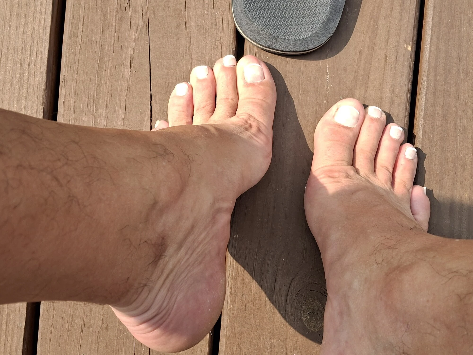 Barefoot with French pedicure