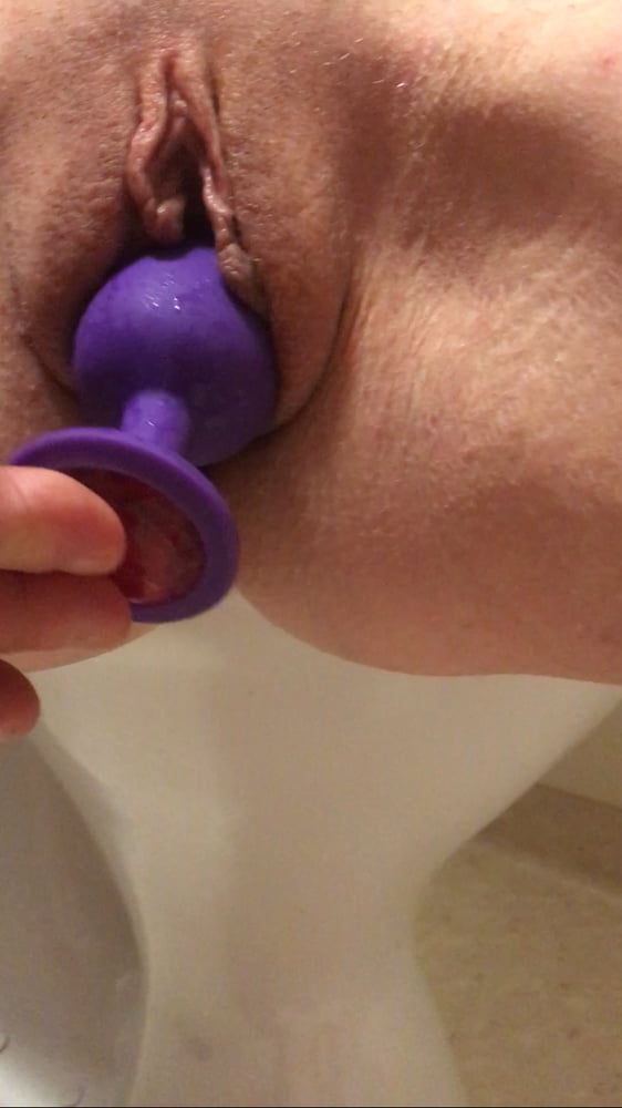 Playing with a dildo a little in bathroom  #20