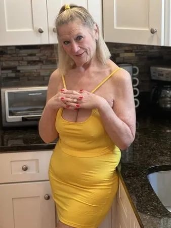    year old stepmom danielle dubonnet in yellow skirt         