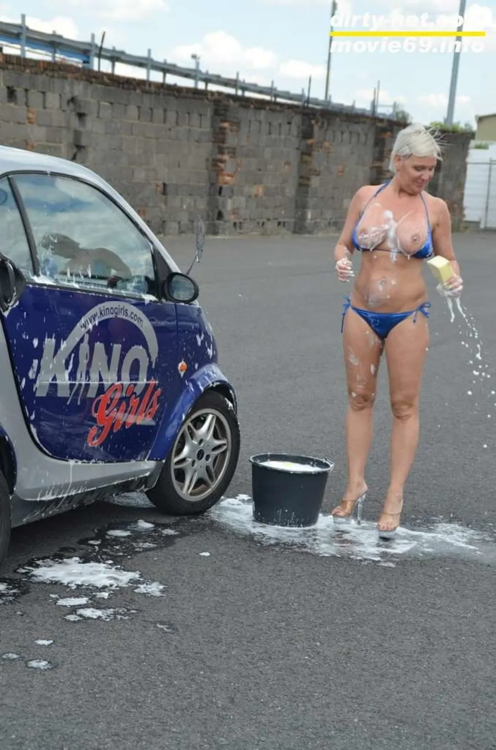 Jill Summer at the carwash in a bikini and topless #23