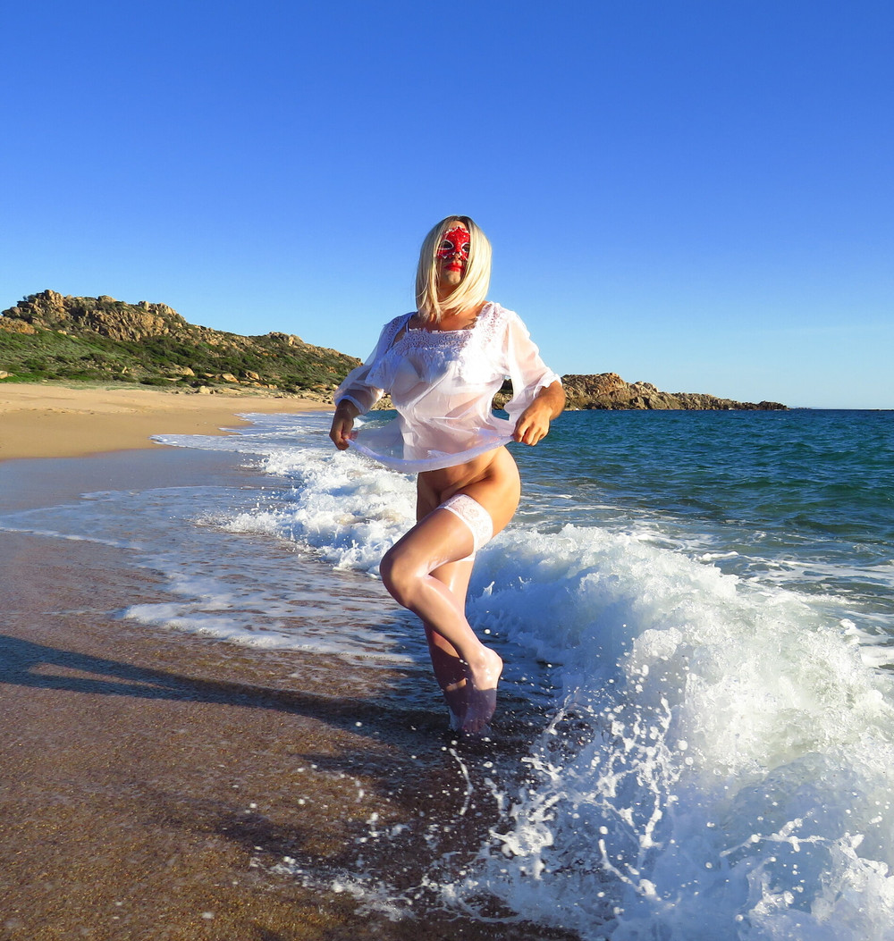 Sexy MILF Blonde shows off her ass on the beach. #21