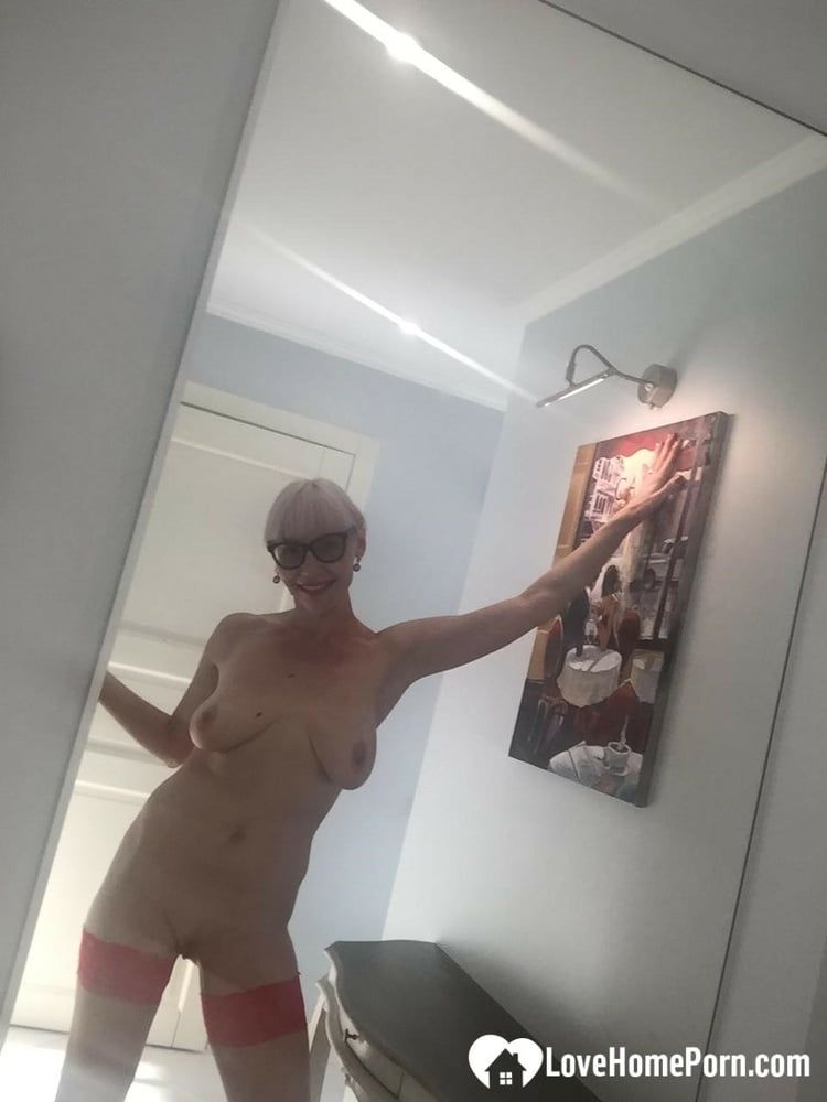 Blonde MILF with glasses teasing with nudes #17