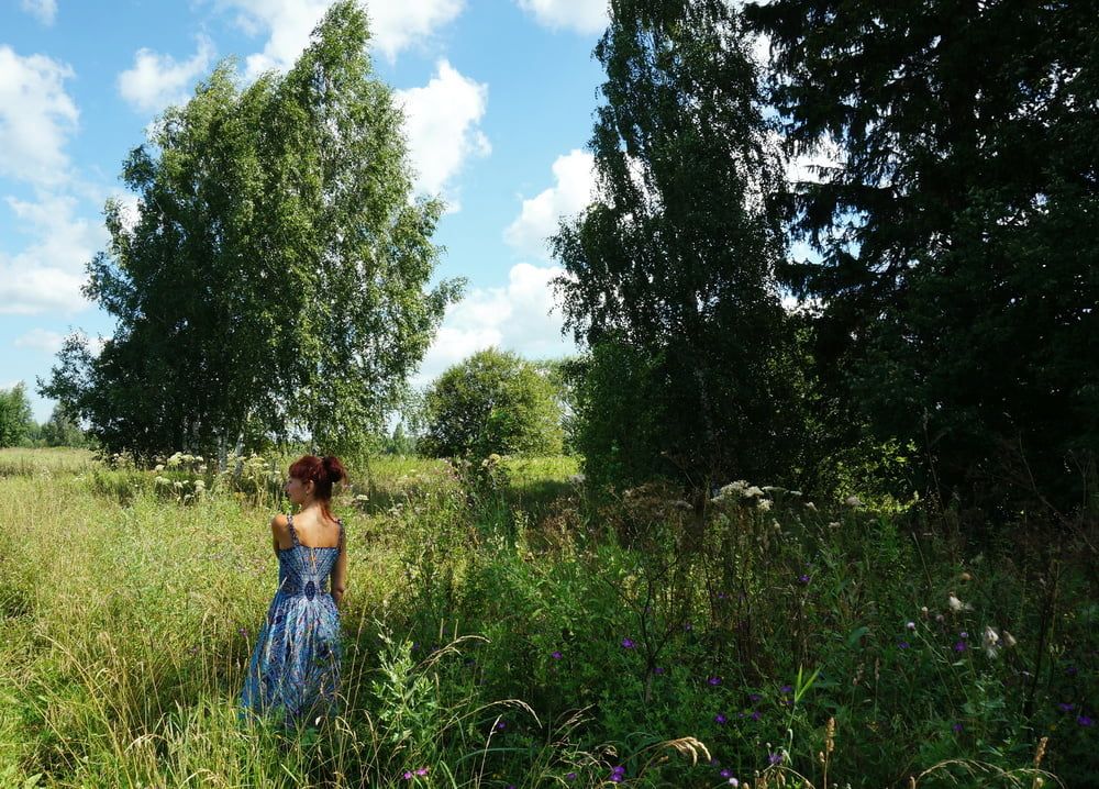 In blue dress in field #11