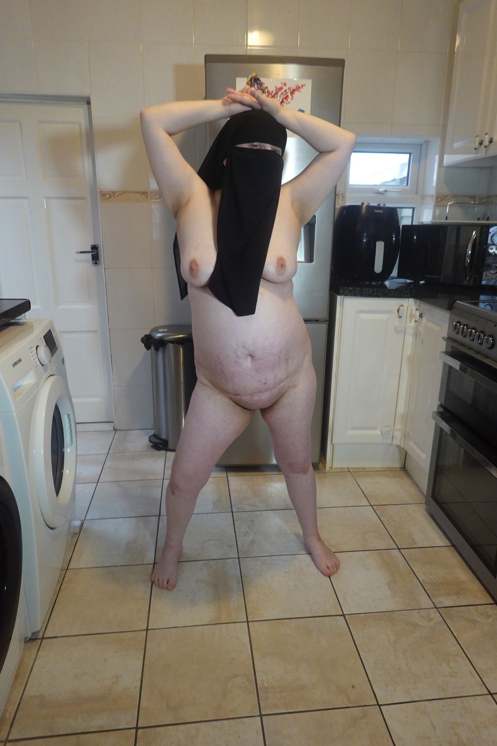 Posing fully nude in Niqab #27