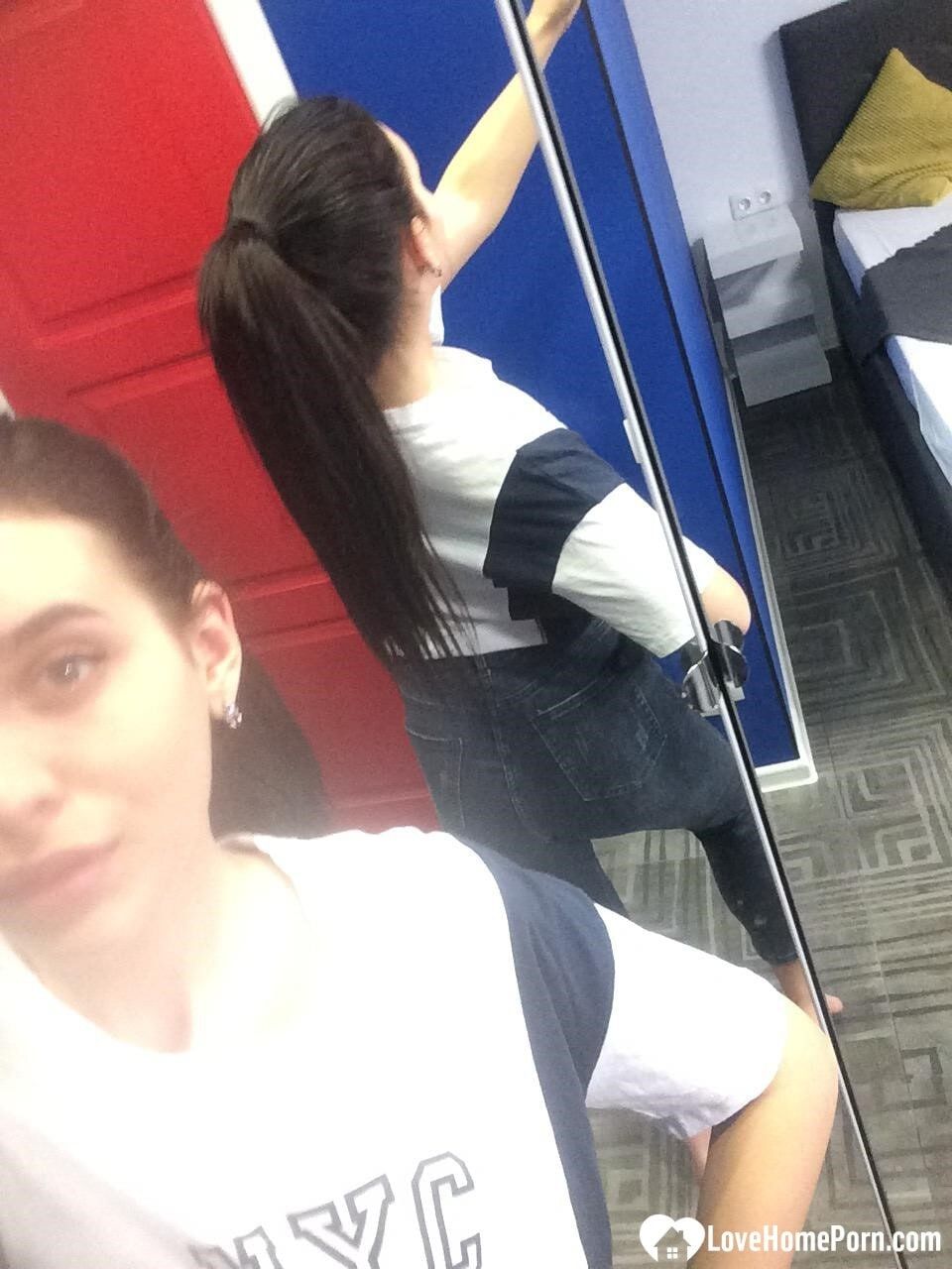 Cute long-haired brunette takes selfies in the bathroom  #48