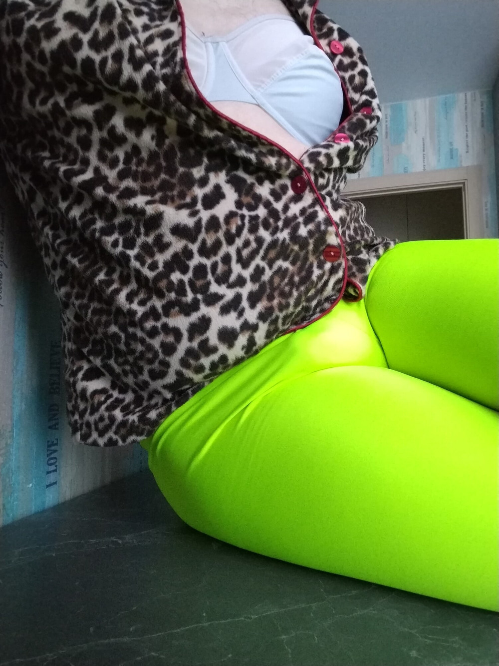 In tight shorts on the kitchen table