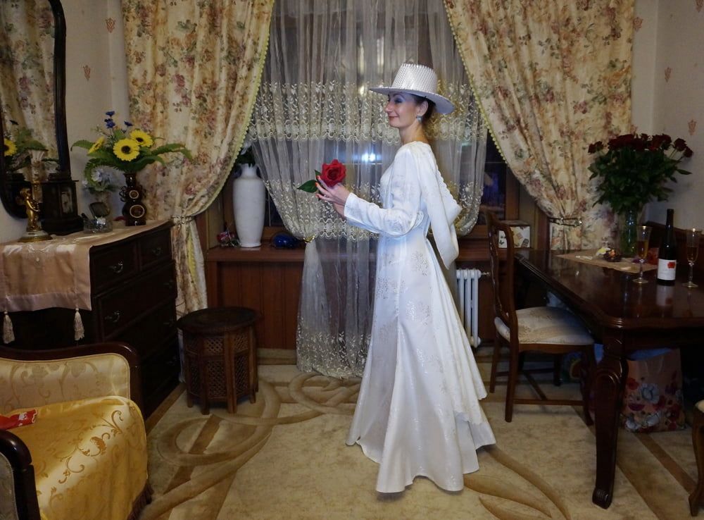 In Wedding Dress and White Hat #25
