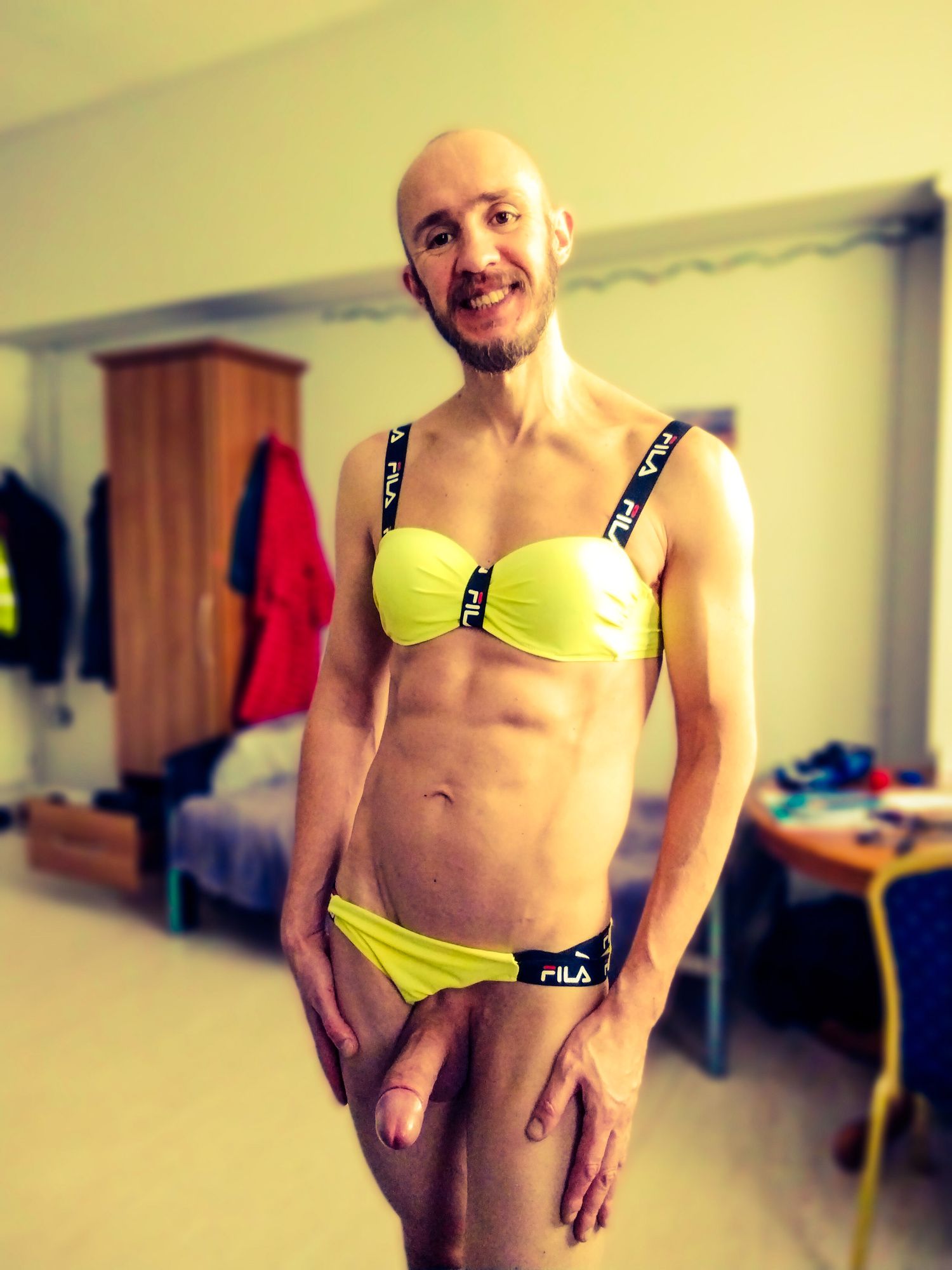 Bearded athletic man posing in yellow swimsuit  #16
