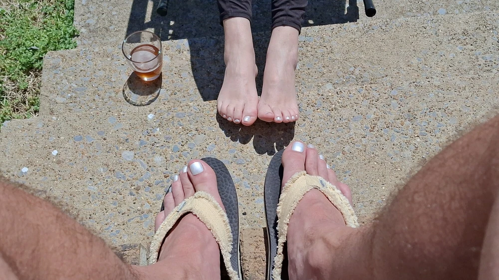 Relaxing outside showing our pedicured and painted toes #25