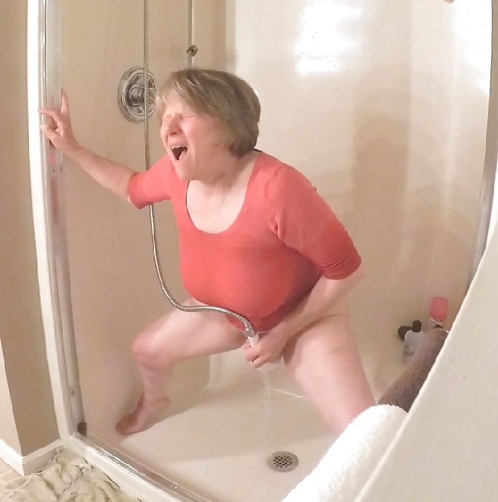 GILF masturbates in wet t-shirt #8