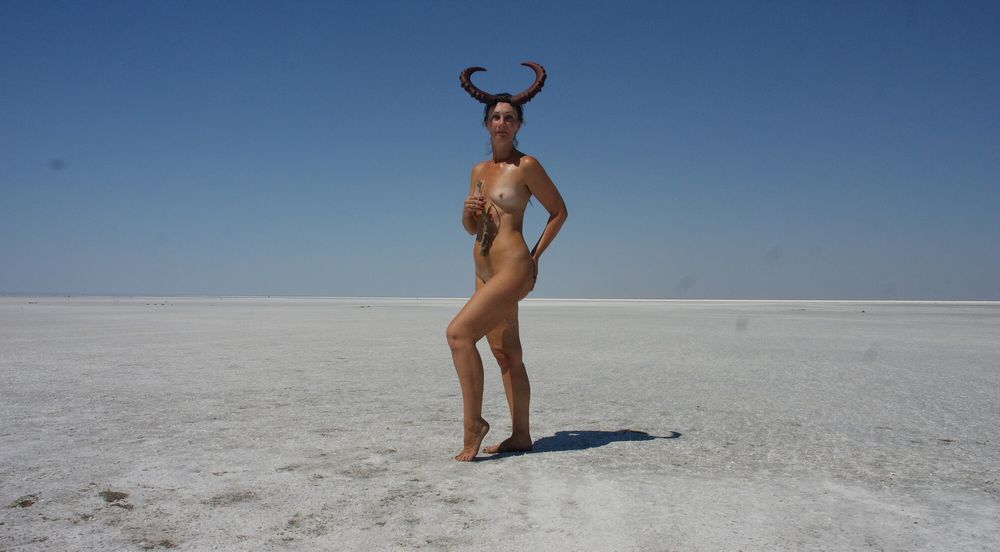 Standing naked on the salt of the salt lake Elton #28