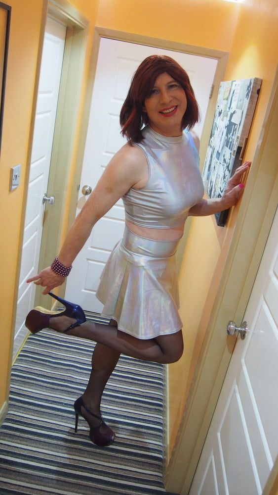 Sissy Lucy showing off her big cock in Silver skater skirt #9