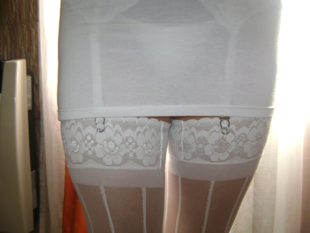 In white lingerie with heels and stockings #30