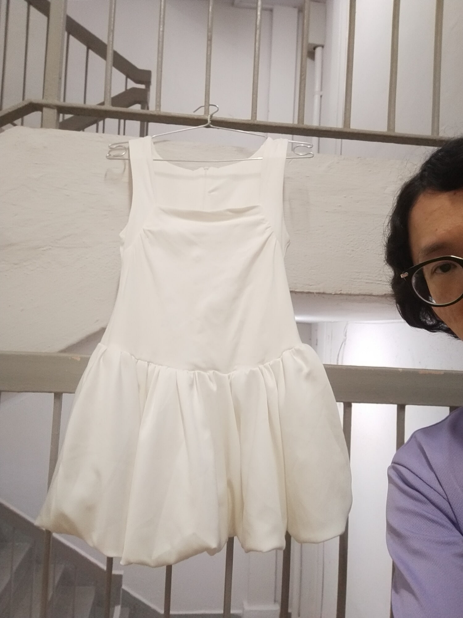 Secretly wearing random woman nightclub dress.