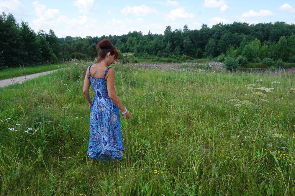 In blue dress in field #34