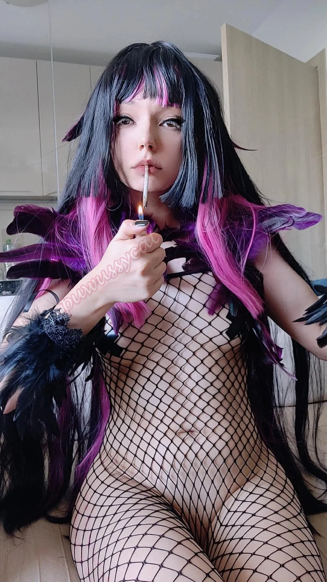 Succubus Smoking in fishnets