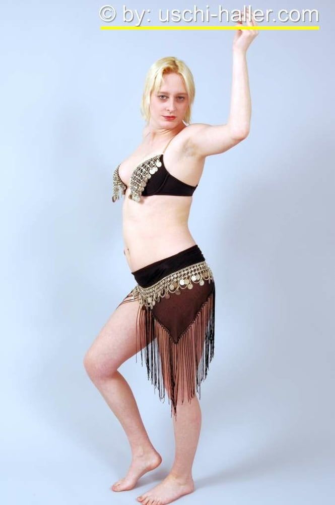 Photo shoot with blonde cum slut Dany Sun as a belly dancer #12