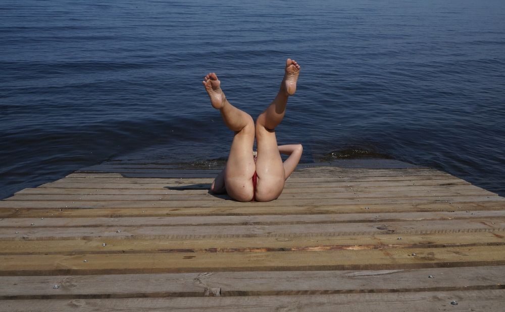 Legs play on a wooden platform #11