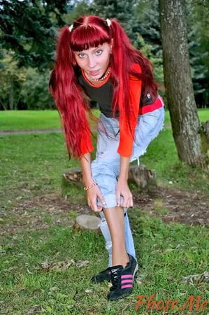 redhead outdoors strips jeans off wearing pantyhose         