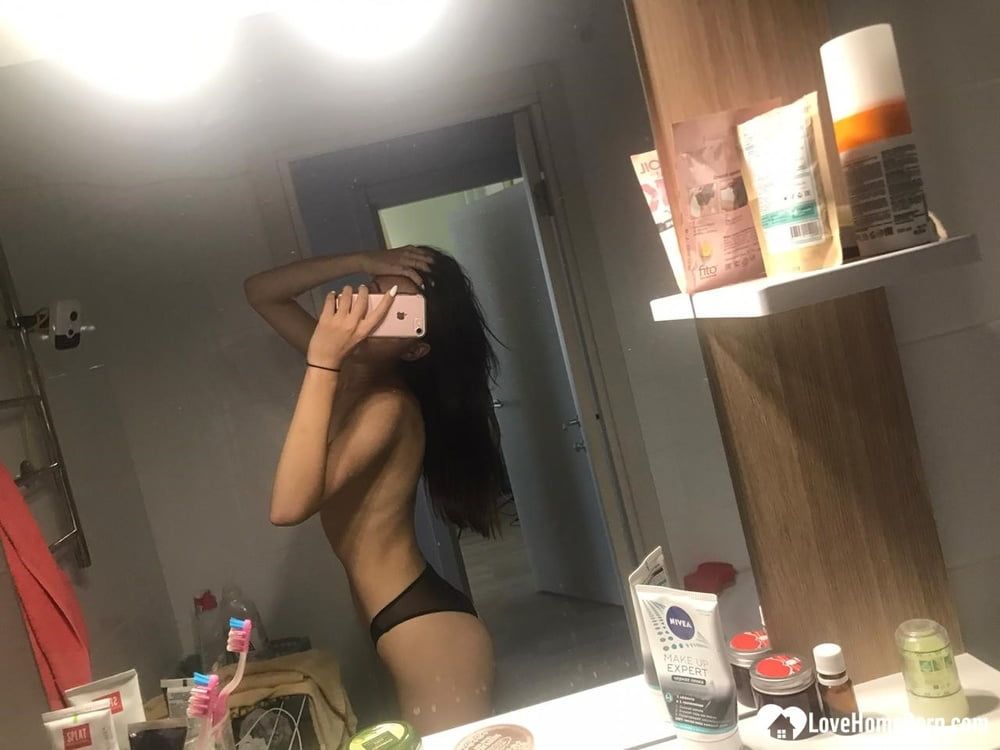 Hot schoolgirl reveals her tits in the mirror #5