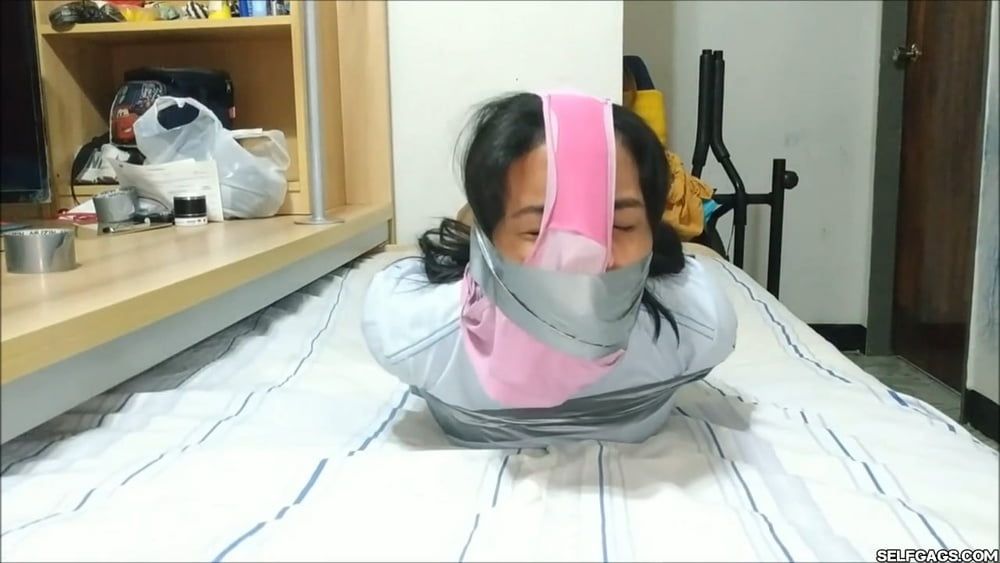 Panty Hooded Girl Gagged With Socks And Tape #11