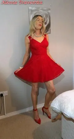    alessia travestita in flirty red dress         