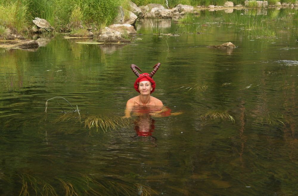 With Horns In Red Dress In Shallow River #37