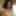 Cute long-haired brunette takes selfies in the bathroom 