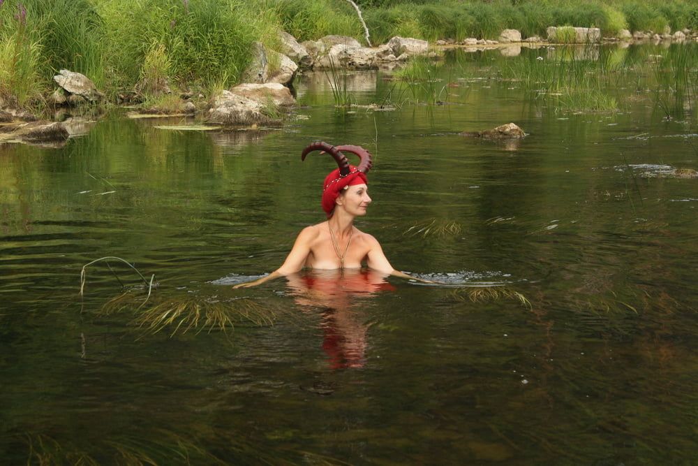 With Horns In Red Dress In Shallow River #45