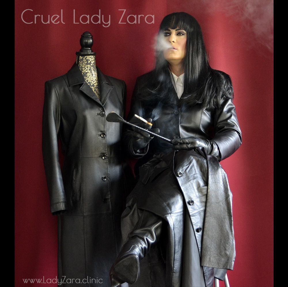 Cruel Lady Zara smokes a cigarette
