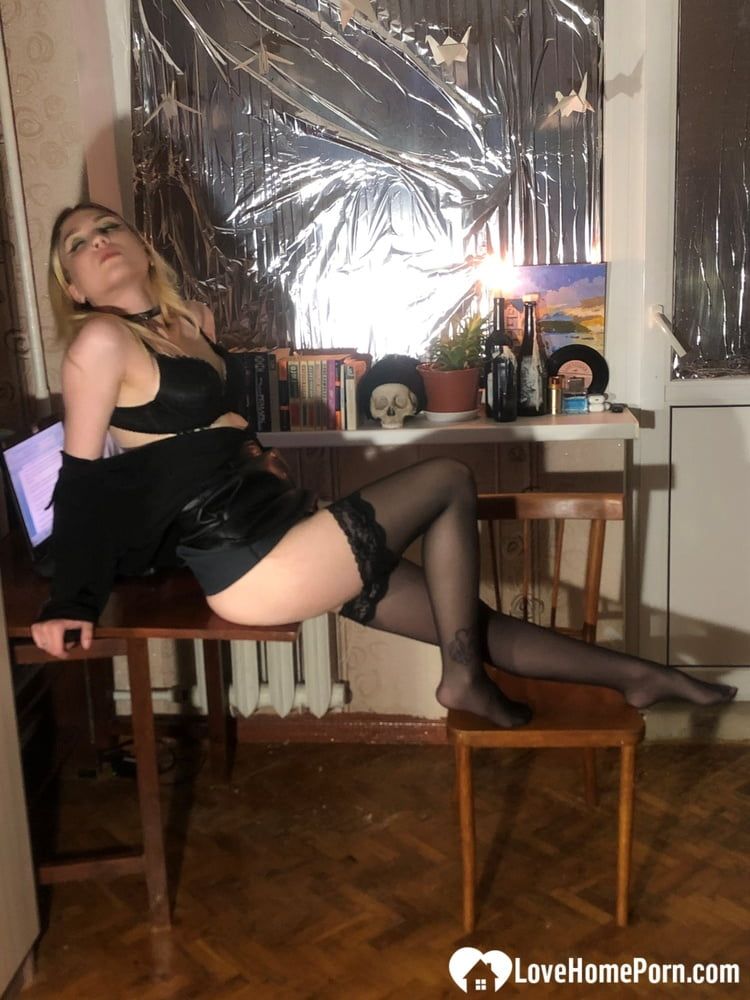Hot blonde in stockings strips her lingerie #16